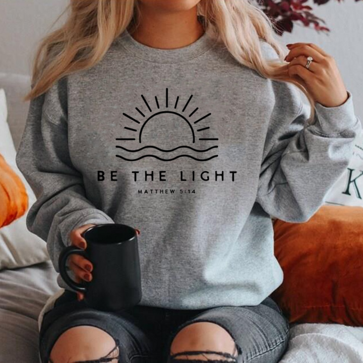 Modischer Pullover oversized "Be The Light"