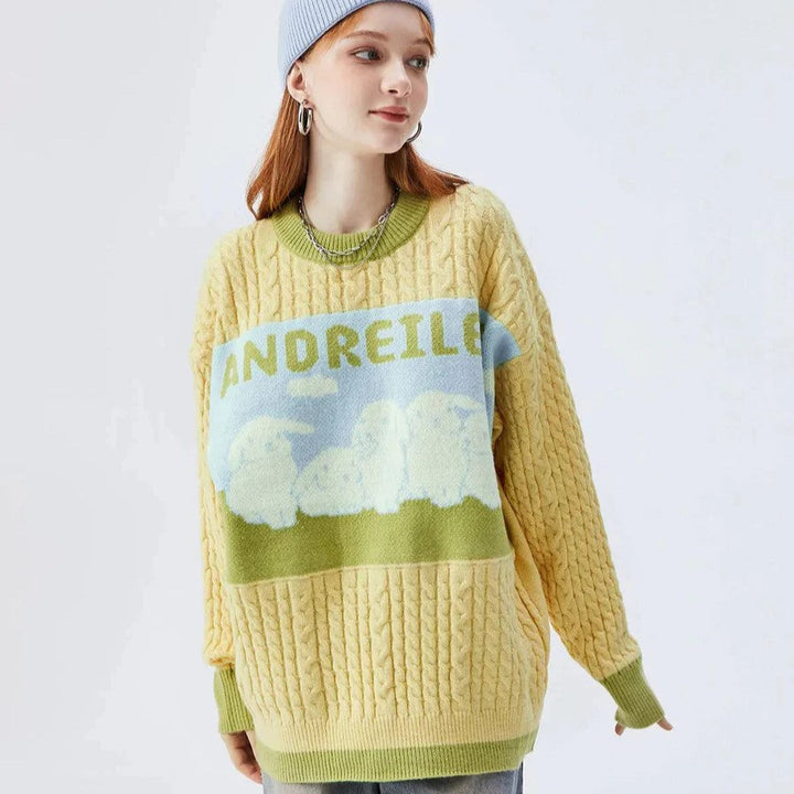 Zopfstrickpullover mit Pastell-Wolkenmotiv